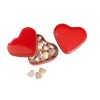 Heart tin box with candies in red
