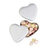 Heart tin box with candies in white