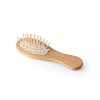 DERN. Wooden hairbrush with round bamboo bristles in Natural