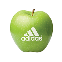 Green apple with printed  logo 