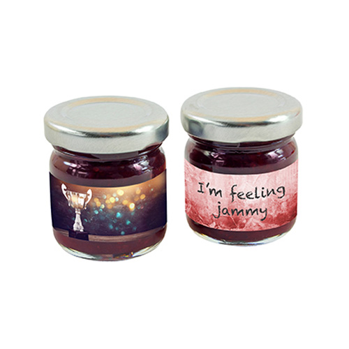 Mini jar of strawberry jam 
